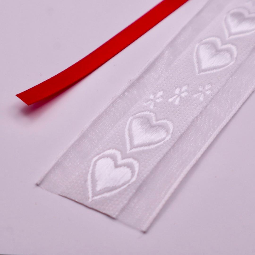 つばきと剣　くるみボタンのヘアリボン　クロスステッチ刺繍 | 4枚目